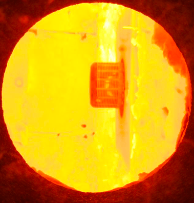 Internal staged radiant wall burner design
